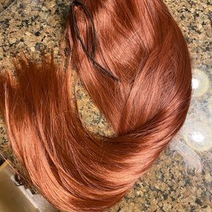 20 inch bellami ponytail clip, never worn. Ginger